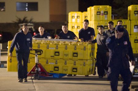 LA County Fire Urban Search and Rescue Task Force 2 prepares for possible deployment to Haiti at the California Task Force 2 warehouse in the Pacoima section of Los Angeles, on Tuesday Jan. 12, 2010.(Xinhua/Reuters Photo)