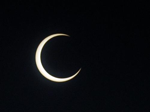 People across China turned their eyes skyward Friday, Jan. 15, when daylight faded as the sun changed into blazing ring surrounding a dim disk Friday afternoon. [Xinhua]