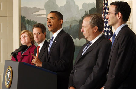 U.S. President Barack Obama (C) makes remarks urging Wall Street to roll back executive bonuses as he proposed a fee to repay taxpayers for a financial bailout at the White House in Washington, January 14, 2010. Obama is joined by (L-R) Chair of the Council of Economic Advisers Christina Romer, Treasury Secretary Timothy Geithner, National Economic Council Director Larry Summers and OMB Director Peter Orszag.