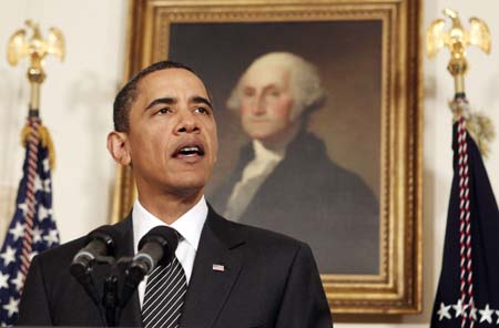 U.S. President Barack Obama makes a statement about Haiti in the Diplomatic Reception Room at the White House in Washington, January 15, 2010. [Xinhua]