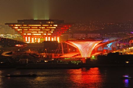 Photo taken on Jan. 16, 2010 shows the effulgent illumination in trial operation to the China Pavilion and Sunshine Valley of 2010 Shanghai World Expo, in Shanghai, east China. The overall exhibition installation will be finished in late March and the organization of Shanghai Expo goes very well to meet the upcoming 100 days countdown of Shanghai Expo. Since five permanent buildings and about one hundred other pavilions are ready, the overall exhibition installation has already started. (Xinhua/Guo Changyao)