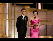 Jim Parsons and Lauren Graham present the Golden Globe Award for Best Performance by an Actor in a Supporting Role in a Series, Mini-series or Motion Picture made for television at the 67th Annual Golden Globe Awards at the Beverly Hilton in Beverly Hills, CA Sunday, January 17, 2010. [HFPA/China.org.cn]