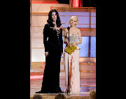 Cher and Christina Aguilera at the 67th Annual Golden Globe Awards at the Beverly Hilton in Beverly Hills, CA Sunday, January 17, 2010. [HFPA/China.org.cn]