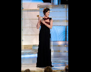 Julianna Margulies accepts the Golden Globe Award for Best Performace by an Actress in a Television Series for her role in 'The Good Wife' (CBS) at the 67th Annual Golden Globe Awards at the Beverly Hilton in Beverly Hills, CA Sunday, January 17, 2010.[HFPA/China.org.cn]