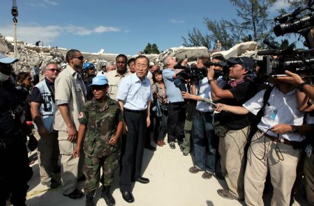U.N. Secretary-General Ban Ki-Moon visits the collapsed U.N. headquarters in Port-au-Prince, Haiti, Sunday, Jan. 17, 2010.