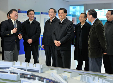 Hu Jintao (4th R), general secretary of the Central Committee of the Communist Party of China, Chinese president and chairman of the Central Military Commission, inspects Shanghai Synchrotron Radiation Facility (SSRF) project, in Shanghai, east China, on Jan. 16, 2010. Hu Jintao made an inspection tour in Shanghai on Jan. 14-17. [Xinhua]