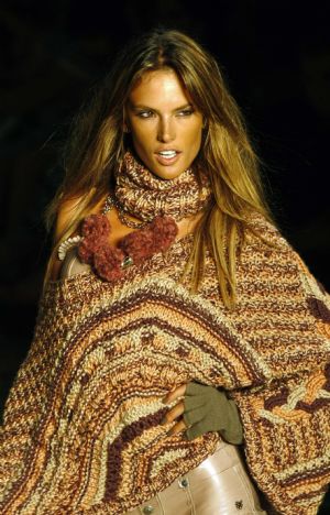 Brazilian top model Alessandra Ambrosio presents a creation from Colcci's Fall/Winter 2010/11 collection during the Sao Paulo Fashion Week in Sao Paulo January 17, 2010. 