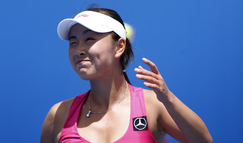 Peng Shuai of China reacts during her first round match of women's singles against her compatriot Zheng Jie in 2010 Australian Open at Court 8 in Melbourne Park, Australia, Jan. 18, 2010. Peng lost 1-2. (Xinhua/Wang Lili) 