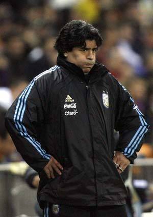 Argentina's national soccer coach Diego Maradona reacts during their friendly soccer match against Spain at the Vicente Calderon stadium in Madrid, November 14, 2009.(Xinhua/Reuters Photo) 