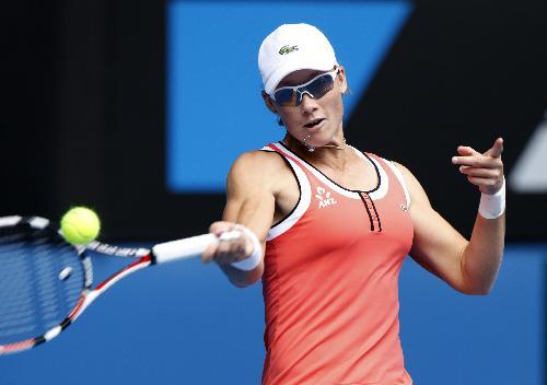 Samantha Stosur of Australia returns the ball during the first round match of women's singles against Han Xinyun of China in 2010 Australian Open at Rod Laver Arena in Melbourne, Jan. 19, 2010. 