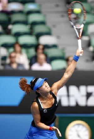 Han Xinyun of China competes during the first round match of women's singles against Samantha Stosur of Australia in 2010 Australian Open at Rod Laver Arena in Melbourne, Jan.19, 2010. 