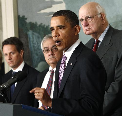 U.S. President Barack Obama speaks about financial reform after his meeting with Presidential Economic Recovery Advisory Board Chair Paul Volcker (R) at the White House in Washington January 21, 2010. (Xinhua/Reuters Photo)