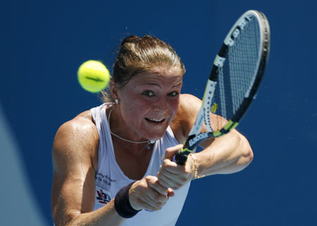 Dinara Safina of Russia hits a return against Agnieszka Radwanska of Poland during the Sydney International tennis tournament January 12, 2010.