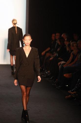 A model presents a creation of German brand 'Mongrels in Common' during the Mecedes-Benz Berlin Autumn/Winter Fashion week 2010, in Berlin, capital of Germany, on Jan. 21, 2010. 