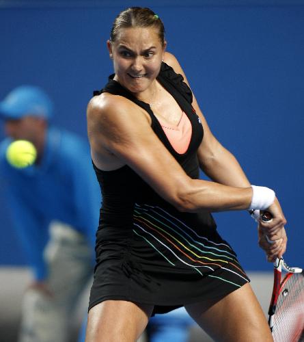 Nadia Petrova of Russia returns the ball during the third round match of women's singles agasint Kim Clijsters of Belgium in 2010 Australian Open Tennis Championship at Rod Laver Arena in Melbourne Park, Jan.22, 2010. Petrova won 2-0.