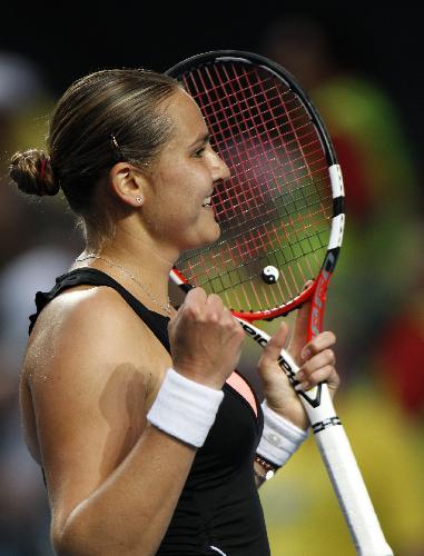 Nadia Petrova of Russia celebrates after the third round match of women's singles agasint Kim Clijsters of Belgium in 2010 Australian Open Tennis Championship at Rod Laver Arena in Melbourne Park, Jan.22, 2010. Petrova won 2-0. 