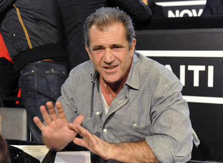 Actor Mel Gibson waits to answer phones during the 'Hope For Haiti Now: A Global Benefit For Earthquake Relief' telethon in Los Angeles, California January 22, 2010. 