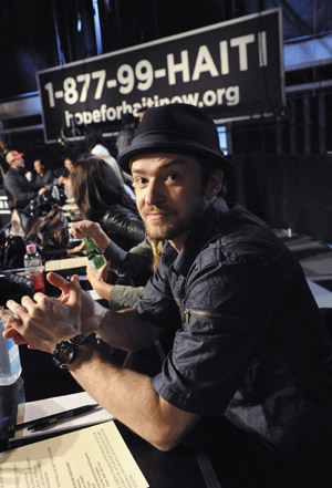Singer Justin Timberlake waits to answer phones during the 'Hope For Haiti Now: A Global Benefit For Earthquake Relief' telethon in Los Angeles, California January 22, 2010.