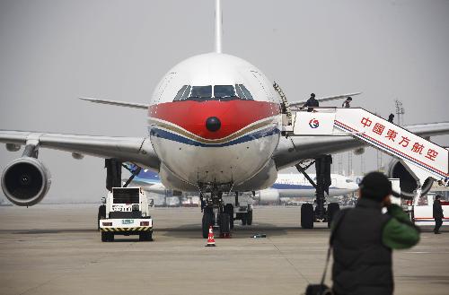 China Eastern Airlines' liner A340 prepare to take off at Shanghai Hongqiao Airport Jan. 23, 2010. The plane will carry another 77-member medical and epidemic prevention team and more than 20 tons of relief materials to Haiti on Sunday.