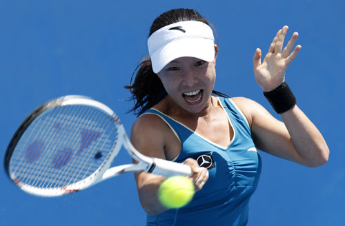 Zheng Jie of China returns the ball during the second round match of women's singles against Maria Jose Martinez Sanchez of Spain at the Australian Open tennis tournament in Melbourne, Australia, on Jan. 20, 2010. Zheng won 2-1 and qualified for the next round.