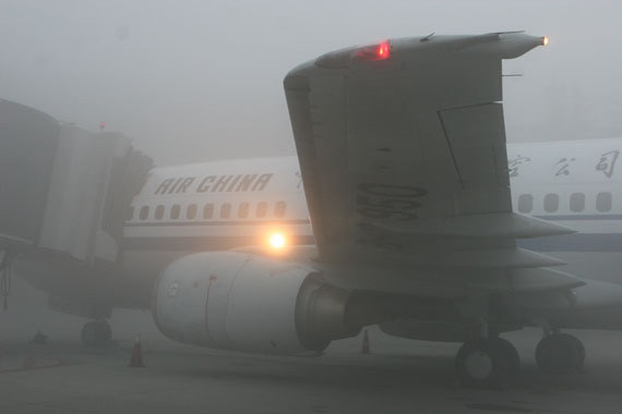 Thick fog delayed 111 flights and left more than 10,000 passengers stranded at an airport in southwest China's Sichuan Province Monday.