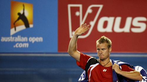 Lleyton Hewitt of Australia leaves the court after the fourth round match of men's singles against Roger Federer of Switzerland in 2010 Australian Open Tennis Championship in Melbourne, Australia, Jan. 25, 2010. (Xinhua/Wang Lili) 