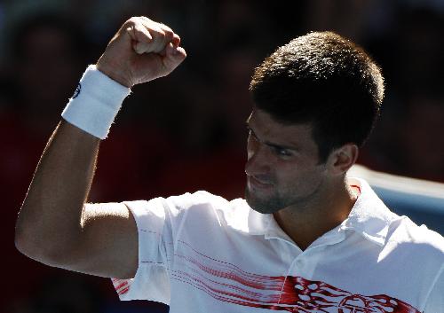 Novak Djokovic of Serbia celebrates after the fourth round match of men's singles against Lukasz Kubot of Poland in 2010 Australian Open Tennis Championship in Melbourne, Jan. 25, 2010. (Xinhua/Wang Lili)