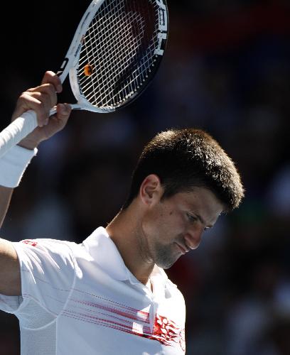 Novak Djokovic of Serbia celebrates after the fourth round match of men's singles against Lukasz Kubot of Poland in 2010 Australian Open Tennis Championship in Melbourne, Jan. 25, 2010. (Xinhua/Wang Lili)