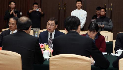 The first expert discussion is held in talks aimed at paving the way for the Economic Cooperation Framework Agreement (ECFA), an economic deal which is expected to boost the cross-Taiwan Straits economic ties, in Beijing, capital of China, Jan. 26, 2010. (Xinhua/Gao Xueyu)