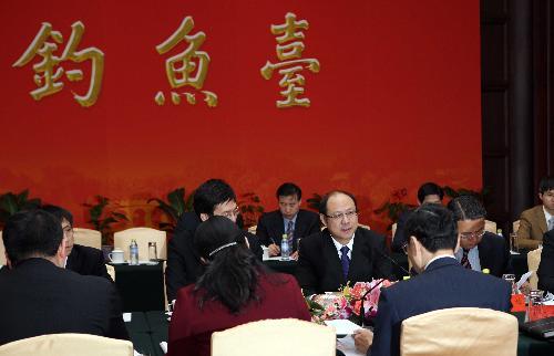 The first expert discussion is held in talks aimed at paving the way for the Economic Cooperation Framework Agreement (ECFA), an economic deal which is expected to boost the cross-Taiwan Straits economic ties, in Beijing, capital of China, Jan. 26, 2010. (Xinhua/Gao Xueyu)