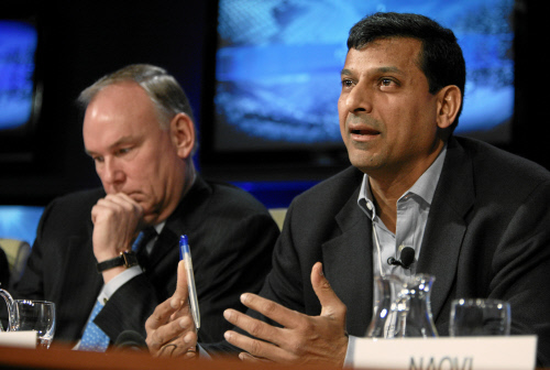 Dennis Nally, (L) Chairman, PricewaterhouseCoopers International, PricewaterhouseCoopers, USA, and Raghuram G. Rajan (R) Eric J. Gleacher Distinguished Service Professor of Finance, University of Chicago Booth School of Business, USA are seen during the session 'What Is the 'New Normal' for Global Growth?' of the Annual Meeting 2010 of the World Economic Forum in Davos, Switzerland, January 27, 2010 at the Congress Centre. [WEF]