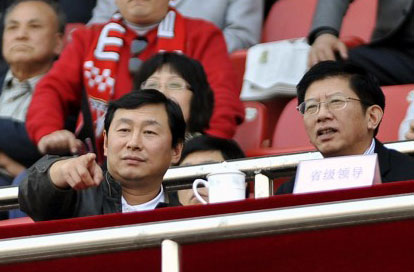 Vice presidents of CFA, Nan Yong (left) and Yang Yimin (right) watch a game.