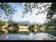 Hongcun is a village in Yixian county, Anhui province, located near the southwest slope of Mount Huangshan, in China.It is listed as one of China's top 10 charming villages and together with Xidi Village it was added to UNESCO's World Cultural Heritage List in 2000. [China.org.cn] 