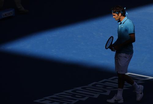 Roger Federer of Switzerland reacts during the quarter-final match of men's singles against Nikolay Davydenko of Russia at 2010 Australian Open Tennis Championship at Rod Laver Arena in Melbourne, Australia, Jan. 27, 2010. Federer won 3-1.