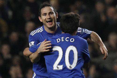 Chelsea's Frank Lampard, left, celebrates with his teammate Deco after scoring his side's second goal during the English Premier League soccer match between Chelsea and Birmingham City at Stamford Bridge stadium in London, Wednesday, Jan. 27, 2010. Chelsea won 3-0.