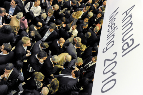 Participants move into the congress hall at the congress centre for the 'Opening Plenary of the World Economic Forum Annual Meeting 2010' of the Annual Meeting 2010 of the World Economic Forum in Davos, Switzerland, January 27, 2010. 