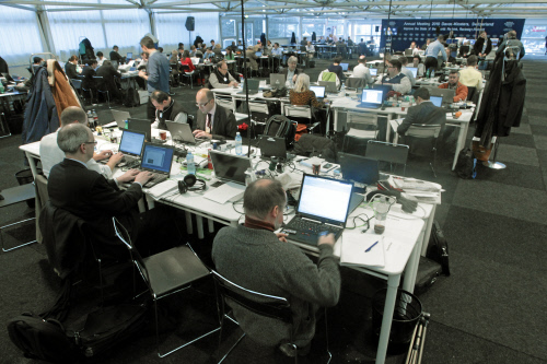 Journalists work on their computers at the media centre during the Annual Meeting 2010 of the World Economic Forum in Davos, Switzerland, January 27, 2010.