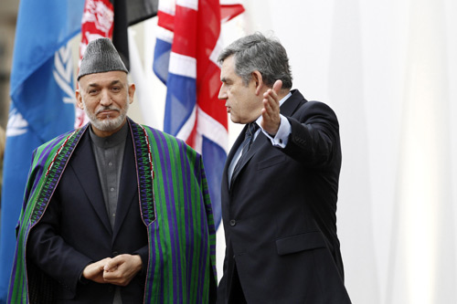 Britain&apos;s Prime Minister Gordon Brown (R) and Afghanistan&apos;s President Hamid Karzai, arrive at the &apos;Afghanistan: The London Conference&apos;, in London January 28, 2010. (Xinhua/Reuters Photo)