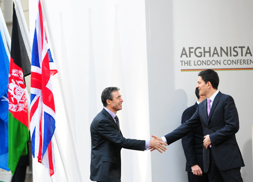 NATO Secretary General Anders Fogh Rasmussen (L) shakes hands with British Foreign Secretary David Miliband at Lancaster House in London Jan. 28, 2010. (Xinhua/Zeng Yi)