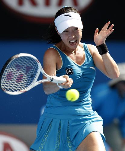 Zheng Jie of China returns the ball during a semifinal of women's singles against Justine Henin of Belgium at 2010 Australian Open Tennis Championship in Melbourne, Jan. 28, 2010. Zheng lost 0-2.