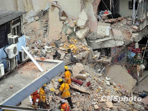 Rescuers found one more body Saturday morning from the rubble of an apartment building that tumbled in Hong Kong on Friday, bringing the death toll to four.