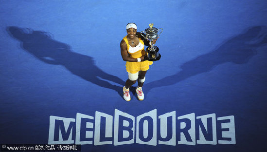 Serena Williams of the US holds the trophy during after beating Justine Henin of Belgium, to win the women's singles final match at the Australian Open tennis championship in Melbourne, Australia, Jan. 30, 2010. [CFP]