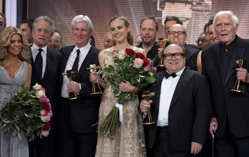 U.S. Choreographer and model coach Bruce Darnell holds a trophy during the awarding ceremony of the German television 'Goldene Kamera' (Golden Camera) media award in Berlin, January 30, 2010. 