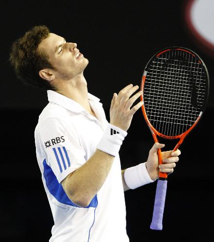 Andy Murray of Great Britain reacts during the final match of men&apos;s singles against Roger Federer of Switzerland at 2010 Australian Open Tennis Championship at Rod Laver Arena in Melbourne, Australia, Jan. 31, 2010. Murray lost 0-3. [Xinhua]