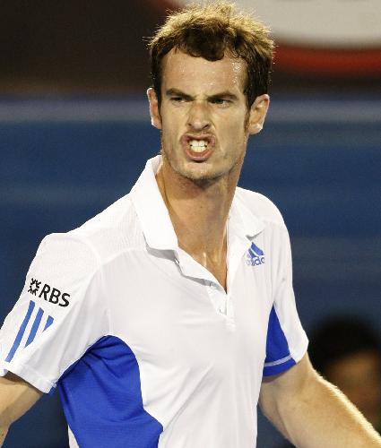 Andy Murray of Great Britain reacts during the final match of men&apos;s singles against Roger Federer of Switzerland at 2010 Australian Open Tennis Championship at Rod Laver Arena in Melbourne, Australia, Jan. 31, 2010. Murray lost 0-3. [Xinhua]