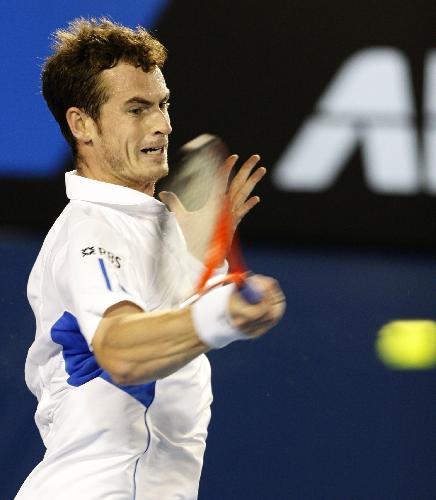 Andy Murray of Great Britain hits a return during the final match of men&apos;s singles against Roger Federer of Switzerland at 2010 Australian Open Tennis Championship at Rod Laver Arena in Melbourne, Australia, Jan. 31, 2010. Murray lost 0-3. [Xinhua] 