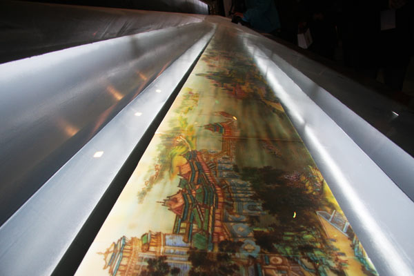 A replica of China's famous panoramic painting Along the River during the Qingming Festival by Zhang Zeduan (1085-1145) was showed in the Chocolate Wonderland Park, January 28, 2009. [Photo: CRIENGLISH.com]