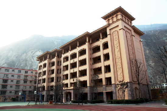 Photo taken on January 27, 2010 shows a new building of Wenchuan 1st Primary school.The new primary school, located on the site of former Weizhou Middle school in Weizhou village, Wenchuan County, covers an area of 20,000 square meters, its total investment cost was 6,000 million yuan, and it can accommodate 1,600 students. [China.org.cn] 