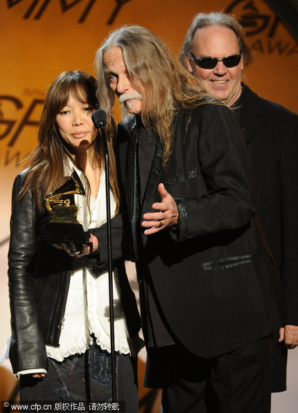 Jenice Ho, Gary Burden and musician Neil Young speak onstage during the 52nd Annual GrammyAwards pre-telecast held at Staples Center on January 31, 2010 in Los Angeles, California.