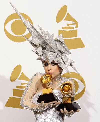 Lady Gaga holds her two Grammy awards for best dance album and best dance recording at the 52nd annual Grammy Awards in Los Angeles January 31, 2010. 